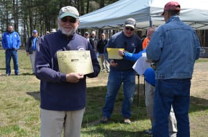 Armando Coello winning one of the Berger Bullets gift certificates. (Photo courtesy of Jeff Rorer)